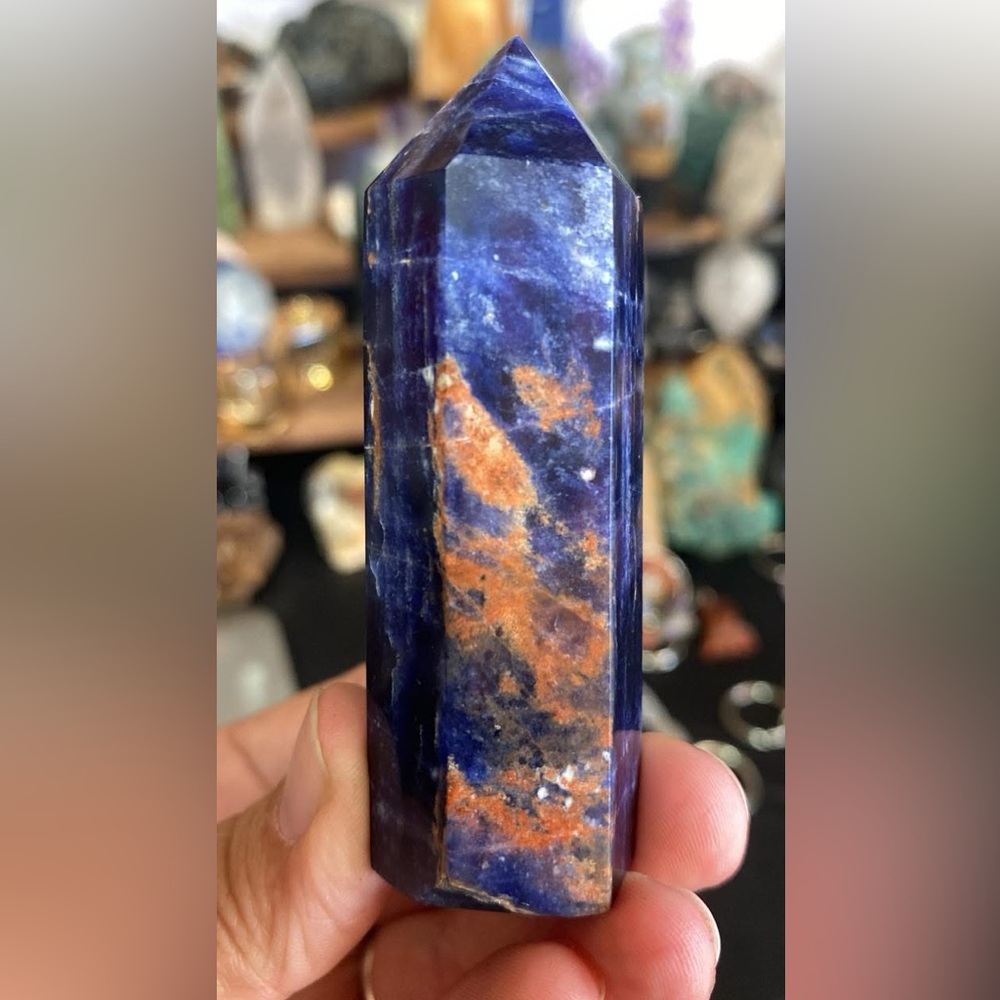 Sodalite with sunstone point
